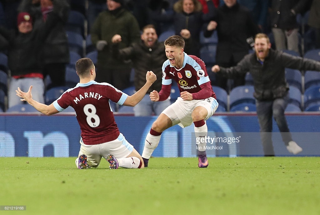 dean-marney-and-johann-guomundsson-of-burnley-celebrates-their-teams-picture-id621219168.jpg