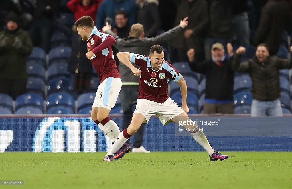 dean-marney-of-burnley-celebrates-his-teams-winning-goal-during-the-picture-id621218746.jpg