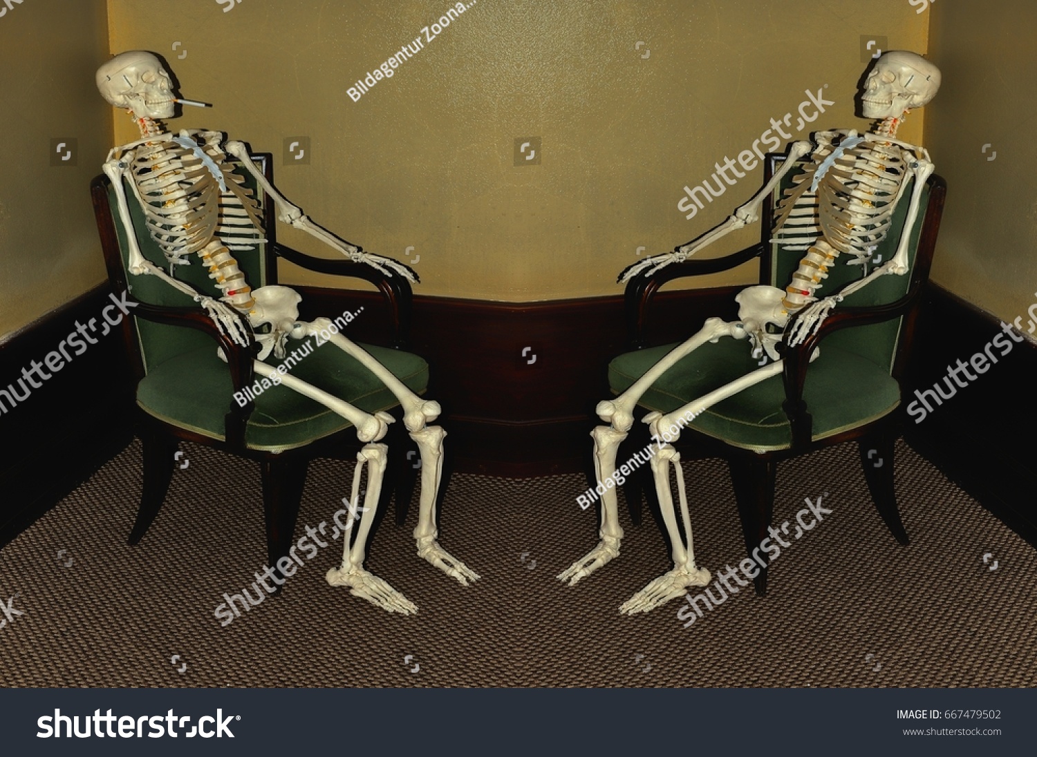 stock-photo-two-skeletons-on-chairs-667479502.jpg
