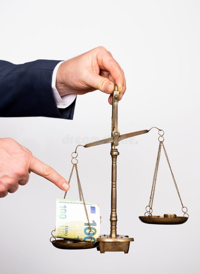 money-weighing-justice-scale-business-man-hand-payment-balance-tax-holding-management-time-value-saving-concept-230736798.jpg
