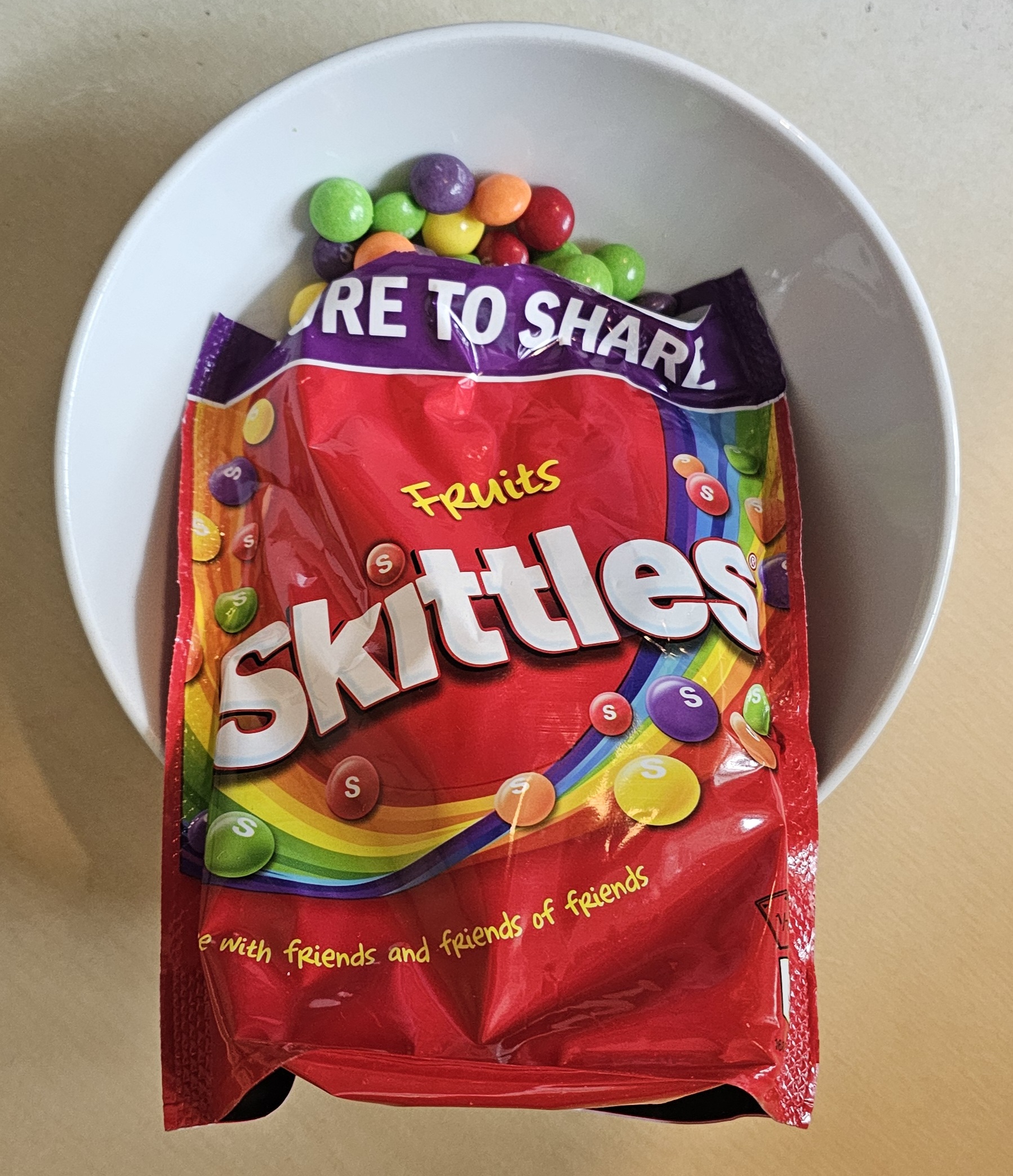 Skittles open 'taste the rainbow'.jpg